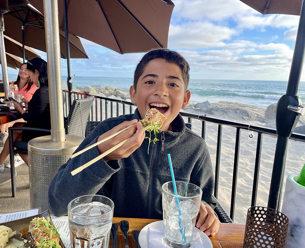 Kidsave-Summer-Miracles-2022-Mike-Eating-Sushi